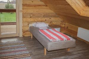 Katil atau katil-katil dalam bilik di Järve Holiday Village