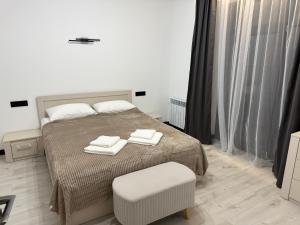 A bed or beds in a room at Memory Apart Hotel