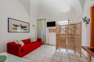 Μια τηλεόραση ή/και κέντρο ψυχαγωγίας στο Relax 2 Cuori, Suite with Jacuzzi in Ostuni Historic Center