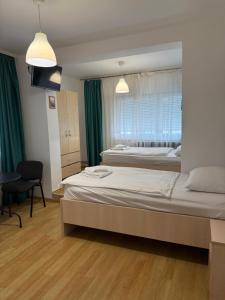Posteľ alebo postele v izbe v ubytovaní Rooms Stella