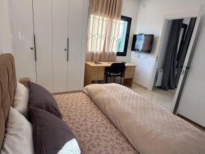 Φωτογραφία από το άλμπουμ του Un bel appartement situé au cœur de La Marsa σε Dar Tahar Zaouch