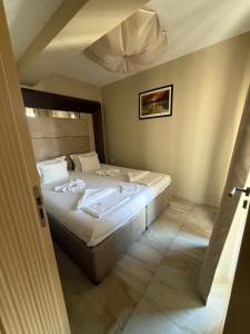 A bed or beds in a room at Botabara Del Mar Boutique