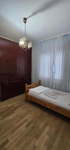 Postel nebo postele na pokoji v ubytování i hostel