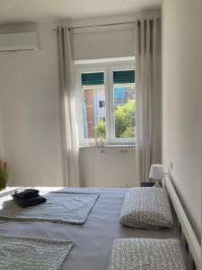 Ένα ή περισσότερα κρεβάτια σε δωμάτιο στο Sunny apartment