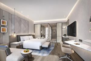 TV a/nebo společenská místnost v ubytování Crowne Plaza Rugao