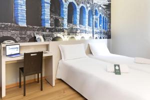 Postel nebo postele na pokoji v ubytování B&B Hotel Verona