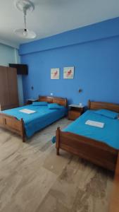 Postel nebo postele na pokoji v ubytování Ainalis Apartments