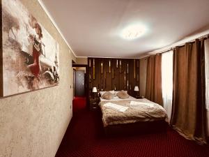 Voodi või voodid majutusasutuse Nowad Hotel toas