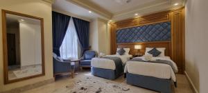 فندق النبراس AlNebras Hotel客房内的一张或多张床位