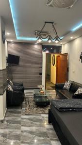 Posezení v ubytování Luxury Upscale Furnished Studio