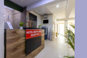 TV a/nebo společenská místnost v ubytování Hotel Metro View