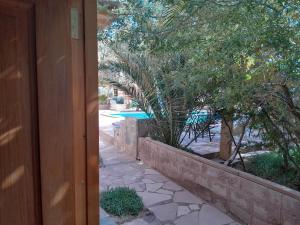 Der Swimmingpool an oder in der Nähe von Hotel-Camping Takha Takha