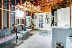 a room with chairs and a door in a building at Dog-Friendly Albuquerque Home 1 Mi to U of NM! in Albuquerque