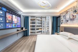 Postel nebo postele na pokoji v ubytování Lilang International Apartment-Guangzhou Pazhou Exhibition Center Branch