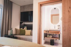 Łóżko lub łóżka w pokoju w obiekcie Ferienwelt Kesselgrub Hotel in Altenmarkt-Zauchensee