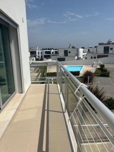 a balcony with a view of a building at G at Bela Baia Salir in Salir de Porto