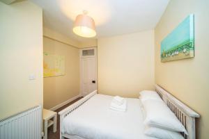 Ένα ή περισσότερα κρεβάτια σε δωμάτιο στο Manor Place +21 φωτογραφίες