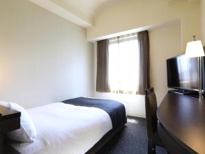 TV a/nebo společenská místnost v ubytování APA Hotel Sagamihara Hashimoto Ekimae