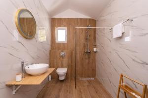 a bathroom with a sink and a toilet and a shower at Villa Leona in Dubrovnik +44 photos