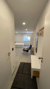 a living room with a couch and a table at Boardinghouse Living in Gemmingen