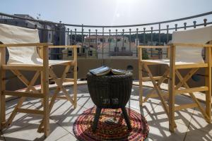 A balcony or terrace at Maria's City Villa