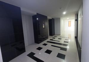Фотография из галереи Apartemen Alton by NARA в городе Jatingaleh