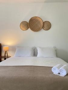 Postel nebo postele na pokoji v ubytování Casa Coco Verde Paraty