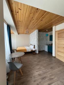 Postel nebo postele na pokoji v ubytování Apart-Hotel Seti