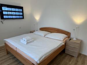 Postel nebo postele na pokoji v ubytování Penzion Trödler