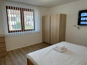 Postel nebo postele na pokoji v ubytování Penzion Trödler