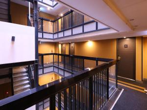 an overhead view of a building with a staircase at APA Hotel Akihabara Ekimae in Tokyo