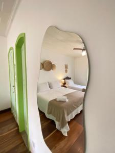 Postel nebo postele na pokoji v ubytování Casa Coco Verde Paraty