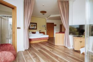 Postel nebo postele na pokoji v ubytování Hotel Garni Günther + 37 fotografií