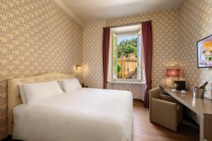 Postel nebo postele na pokoji v ubytování Hotel Royal Victoria, by R Collection Hotels