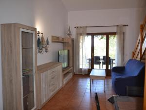 Un televizor și/sau centru de divertisment la Casa acogedora con jardín y piscina en zona tranquila cerca de la playa en L'Estartit - ES-323-16