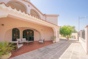 an external view of a house with a patio at House Levante 28 APT 1 in Pula