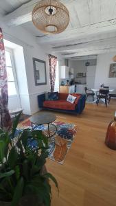 Posedenie v ubytovaní Appartement cosy en cœur de bourg