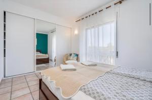 Katil atau katil-katil dalam bilik di Harmony Home Guesthouse