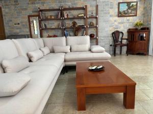 Posezení v ubytování Grand Resort by Greccia Dhermi Prime