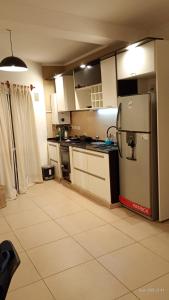 Η κουζίνα ή μικρή κουζίνα στο Dto EXCLUSIVO ZONA PARQUE CON JACUZZI 2 Dorm