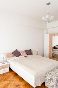 Postel nebo postele na pokoji v ubytování Stunning Design Apartment