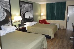 Voodi või voodid majutusasutuse Super 8 by Wyndham St. George UT toas