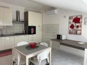 Kuchyň nebo kuchyňský kout v ubytování Casa del Minatore 1 - Gonnesa