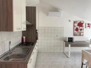 Kuchyň nebo kuchyňský kout v ubytování Casa del Minatore 1 - Gonnesa