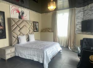 Zdjęcie z galerii obiektu Suite Hollywood by les spa de venus w mieście Charavines