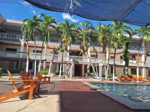 Πισίνα στο ή κοντά στο Coastal Paradise Estudio Cerca de Sunset Park y Playa