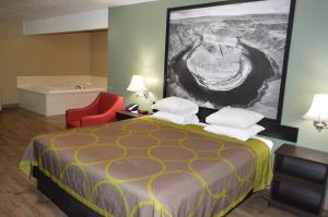 Voodi või voodid majutusasutuse Super 8 by Wyndham St. George UT toas