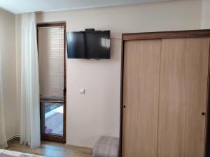 TV a/nebo společenská místnost v ubytování Guest House Juja + 7 fotografií