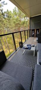 Μπαλκόνι ή βεράντα στο Apartament na Wydmach Shelter +24 φωτογραφίες