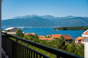 a view of a lake from a balcony at Apartments Dream in Tivat